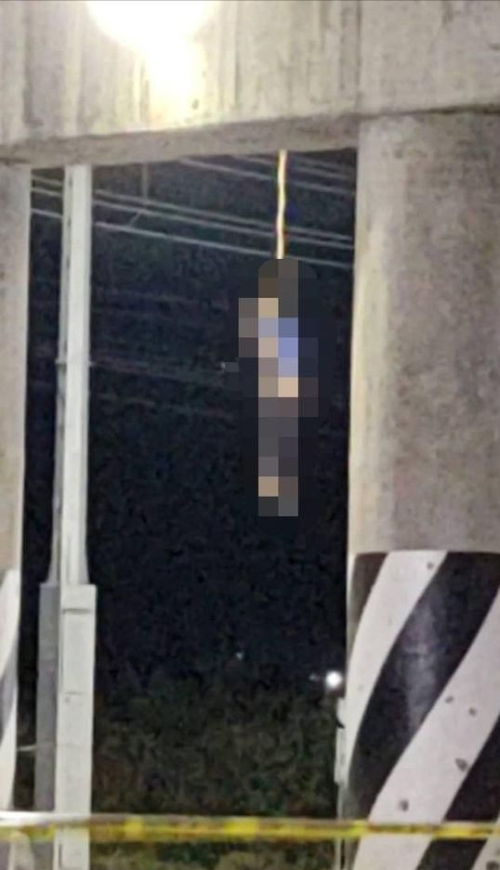 立交桥下发现吊着一具19岁女孩尸体，全身瘀伤，路过司机吓坏