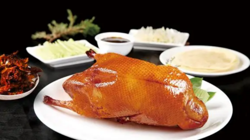 来广州旅游，吃广东烧鹅和北京烤鸭有哪些区别？