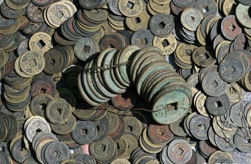 古玩古钱币洗了会影响它的价值吗？